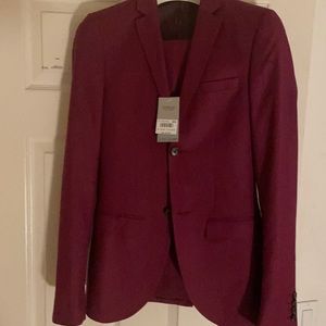 Ultra skinny Top Man fuchsia-colored suit.